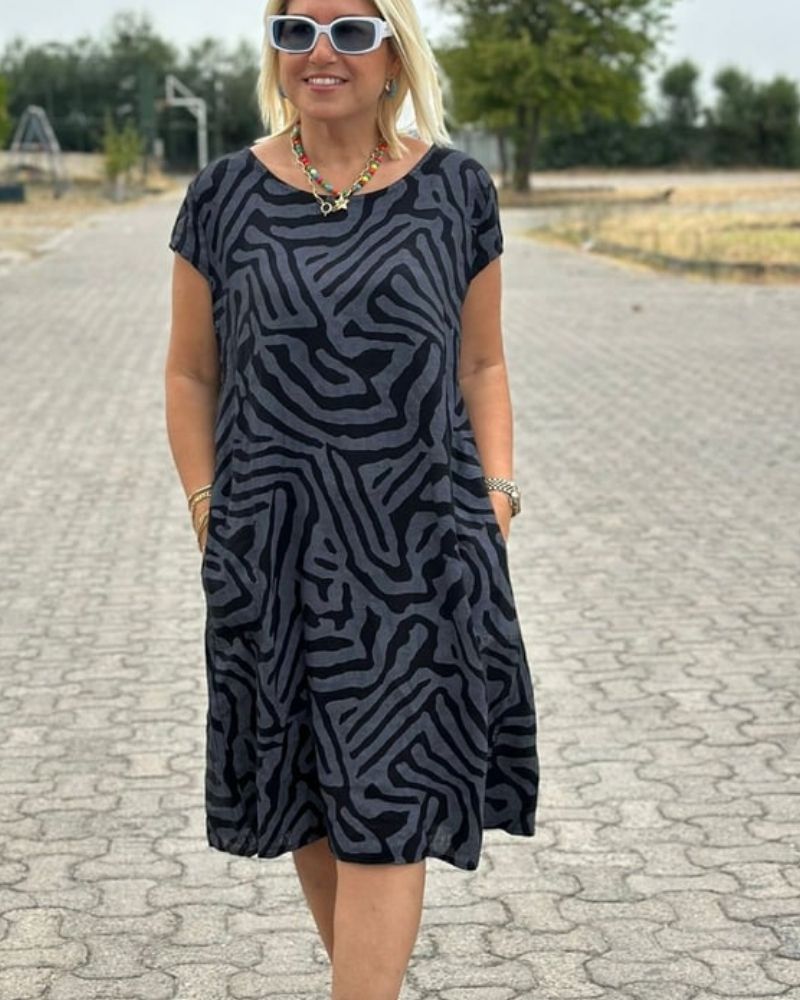Nelia | Letní šaty s kulatým výstřihem a krásným potiskem