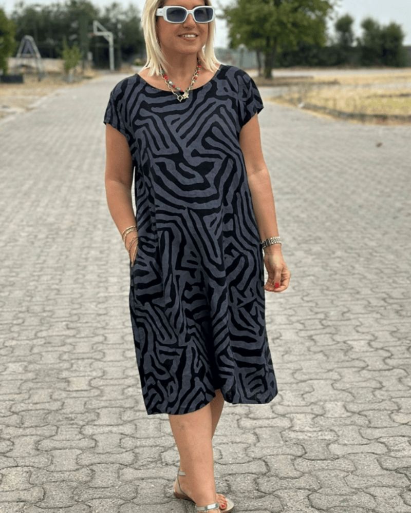 Nelia | Letní šaty s kulatým výstřihem a krásným potiskem